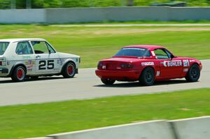 Andrew Jenkins' Spec Miata Mazda Miata and Jimmy Griggs' H Production VW Rabbit