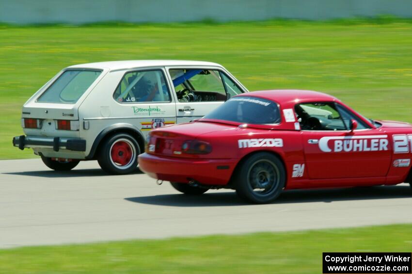 Andrew Jenkins' Spec Miata Mazda Miata and Jimmy Griggs' H Production VW Rabbit