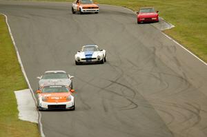 Race Group 4 streams through turns five and six on lap one.