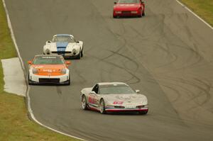 Darrell Peterson's T2 Chevy Corvette, James Berlin's T3 Nissan 350Z, Doug Rippie's GT-1 SSZ Stradale and Matt Lawson's ITE-2 Por