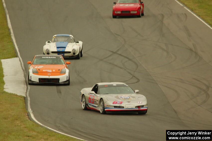 Darrell Peterson's T2 Chevy Corvette, James Berlin's T3 Nissan 350Z, Doug Rippie's GT-1 SSZ Stradale and Matt Lawson's ITE-2 Por