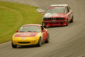 Greg Youngdahl's Spec Miata Mazda Miata and Mike Campbell's ITS BMW 325is