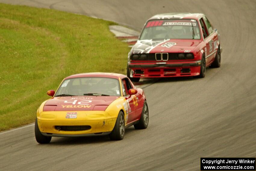 Greg Youngdahl's Spec Miata Mazda Miata and Mike Campbell's ITS BMW 325is