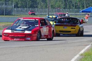 Terry Orr's GTL Honda CRX and Greg Youngdahl's Spec Miata Mazda Miata