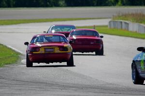 Andrew Jenkins' Spec Miata Mazda Miata and Greg Youngdahl's Spec Miata Mazda Miata