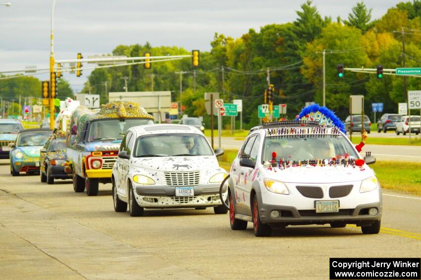 ArtCars parading to Blue Sun Soda