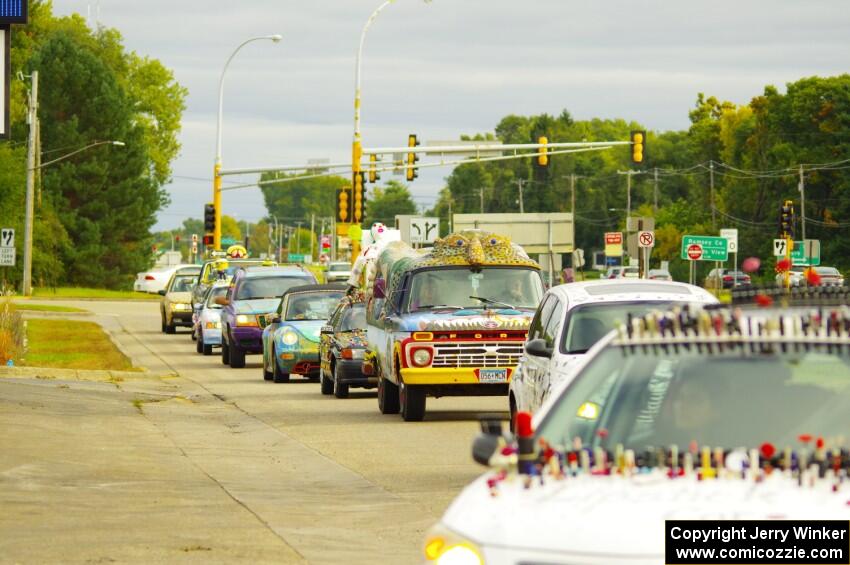 ArtCars parading to Blue Sun Soda