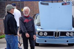 Ed Solstad chats in front of a BMW 3.0 CSL Coupe