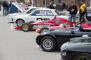 Vintage racing cars lined up on the streets of Osseo.