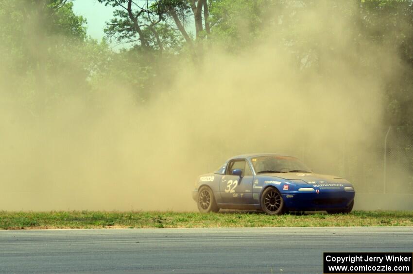 Paul Pridday's Spec Miata Mazda Miata goes off at turn 3.
