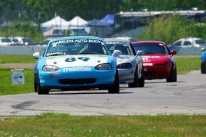 Jamey Randall's, Samantha Silver's, Chris Craft's, and Andrew Jenkins' Spec Miata Mazda Miatas