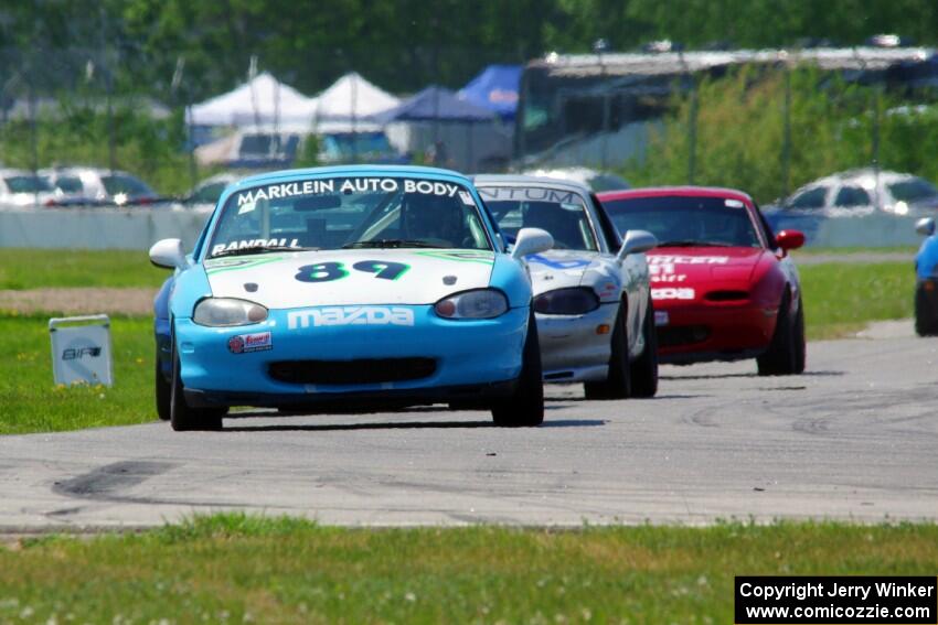 Jamey Randall's, Samantha Silver's, Chris Craft's, and Andrew Jenkins' Spec Miata Mazda Miatas