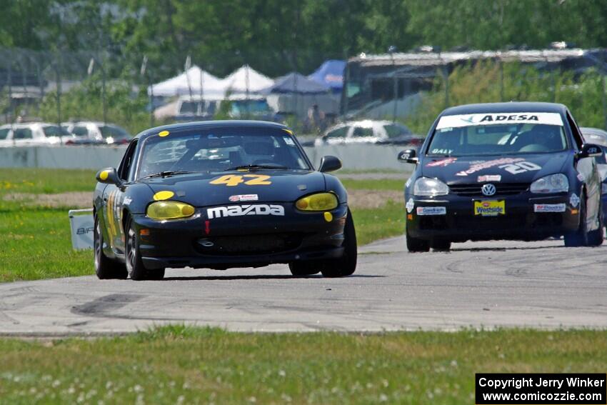 Greg Youngdahl's Spec Miata Mazda Miata and Tom Daly's T4 VW Rabbit