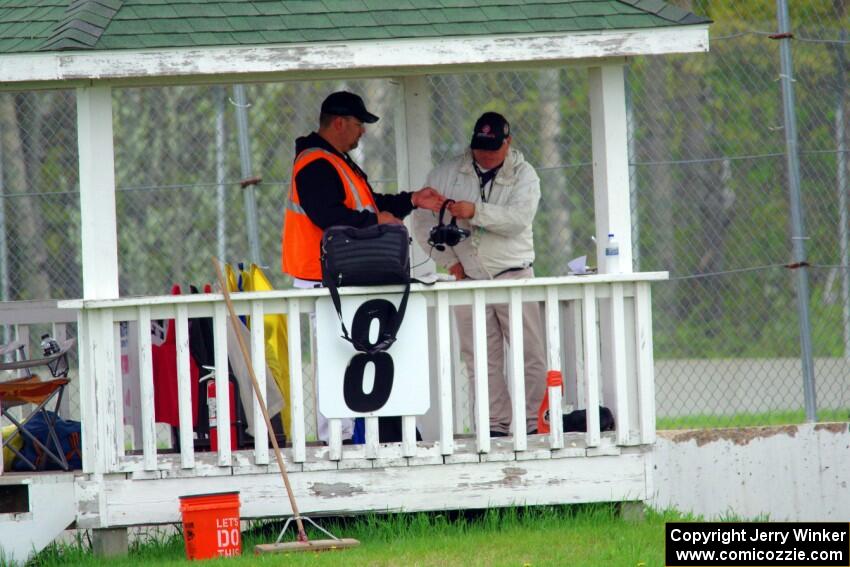 Corner workers at turn 8 prep for the next session.