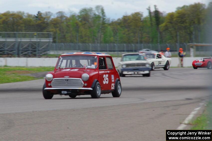Jerry Orr's Austin Mini Cooper S, Damon Bosell's Ford Falcon and Brian Kennedy's Ford Shelby GT350