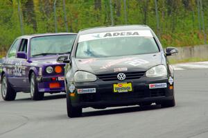 Tom Daly's STU VW Rabbit and Dave LaFavor's ITS BMW 325is