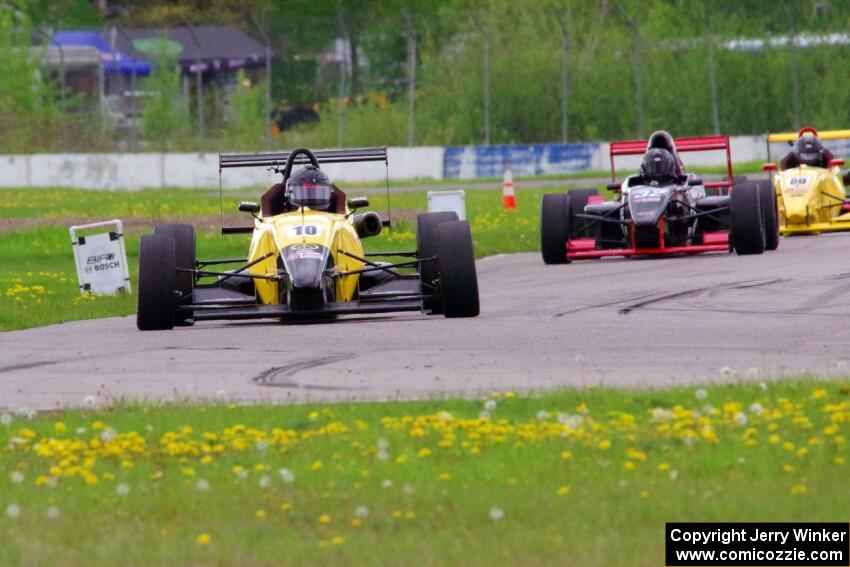 Steve Thomson's Van Diemen DP08/Elan Formula Atlantic, Dave Schaal's Formula Enterprises and Dylan Schenk's Van Diemen RF02/Mazd