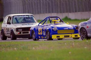 Bob Stream's H Production MG Midget and Jimmy Griggs' H Production VW Rabbit