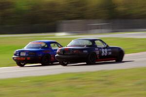 Gordon Kuhnley's and Samantha Silver's Spec Miata Mazda Miatas