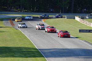 The TC field streams through the Hurry Downs on lap 1.