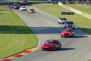 The TC field streams through the Hurry Downs on lap 1.