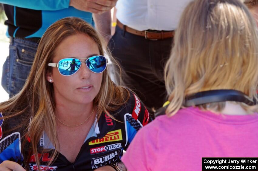 Shea Holbrook talks to a fan at the autograph session.