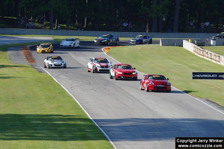 The TC field streams through the Hurry Downs on lap 1.