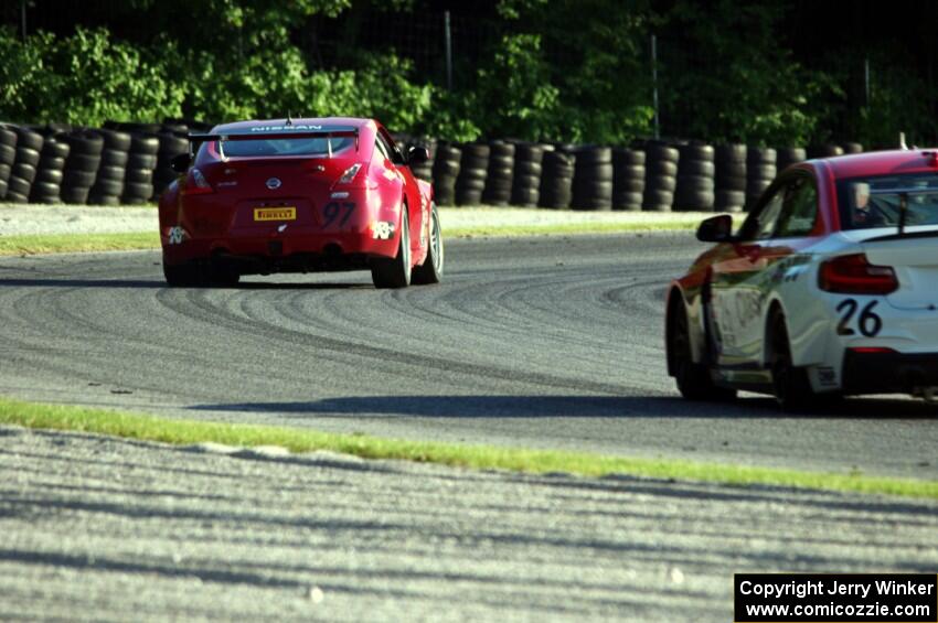 Tony Rivera's Nissan 370Z leads Toby Grahovec's BMW M235iR