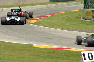 Santiago Urrutia and Kyle Kaiser, both in Dallara IL-15s.