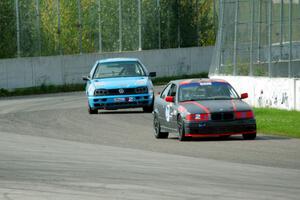 North Loop Motorsports BMW 323is and Blue Sky Racing VW Golf