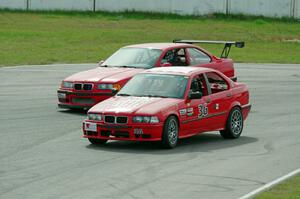 Ambitious But Rubbish Racing BMW 325 and In the Red 1 BMW M3