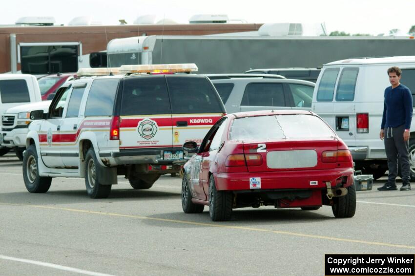 Fujin Racing Honda Civic gets a tow back to the paddock.