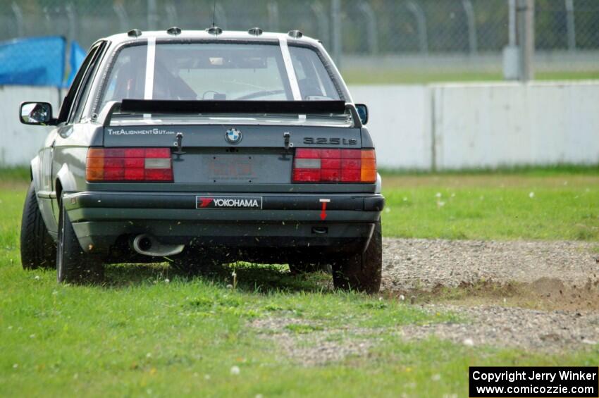 Team Endurance BMW 325is goes off at turn 12.