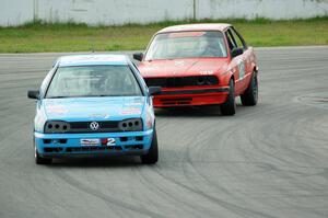 Blue Sky Racing VW Golf and E30 Bombers BMW 325i