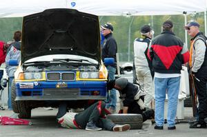 In the Red 2 BMW 325is is repaired back in the paddock.