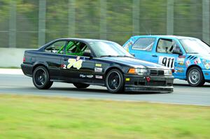 Noobman Racing BMW 325is passes Blue Sky Racing VW Golf