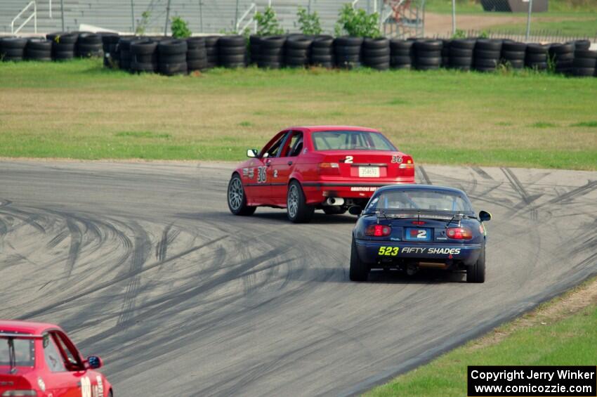 Ambitious But Rubbish Racing BMW 325 and 50 Shades of Blue Mazda Miata