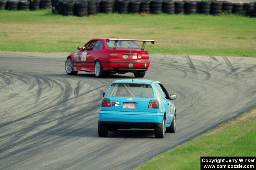 In the Red 1 BMW M3 and Blue Sky Racing VW Golf