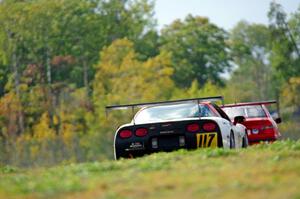 Braunschweig Chevy Corvette chases In the Red 1 BMW M3