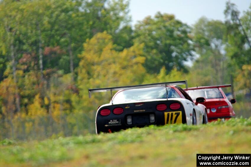 Braunschweig Chevy Corvette chases In the Red 1 BMW M3