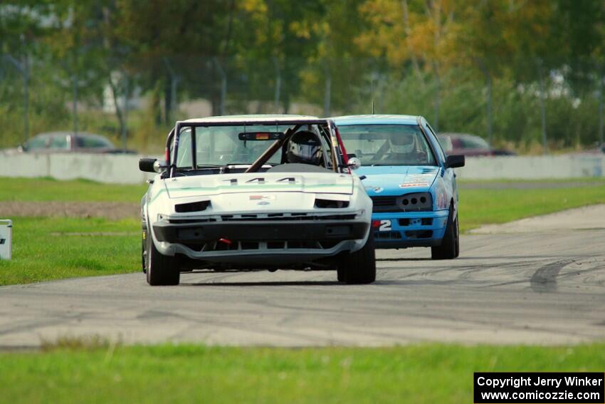 Rat Patrol Triumph TR-7 and Blue Sky Racing VW Golf