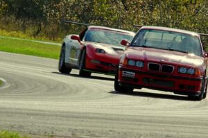 In the Red 1 BMW M3 and Braunschweig Chevy Corvette