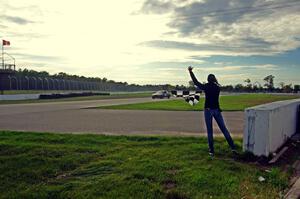 North Loop Motorsports BMW 323is takes the checkered flag.