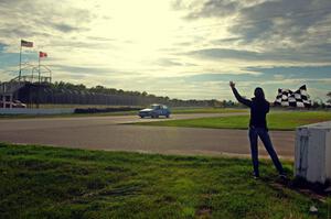 Blue Sky Racing VW Golf takes the checkered flag.