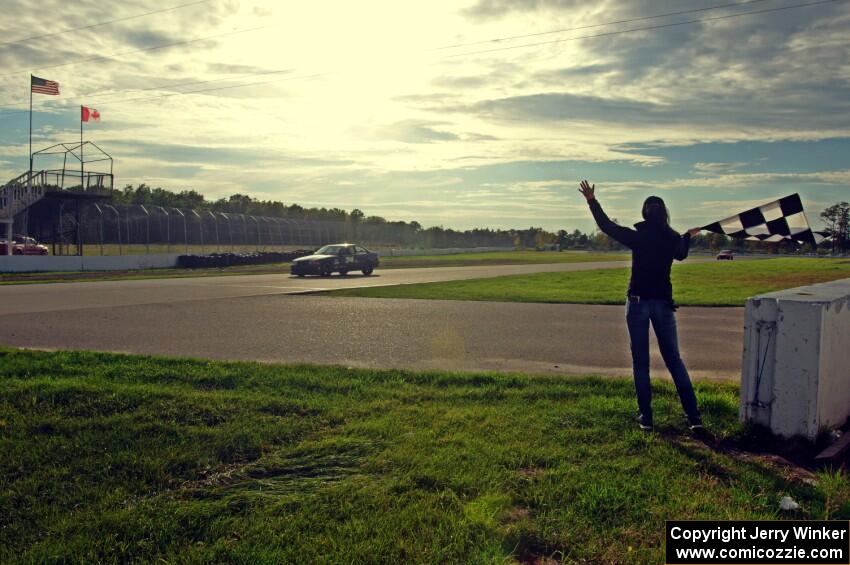 Noobman Racing BMW 325is takes the checkered flag.