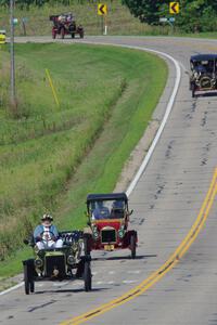 Gregg Lange's 1907 Ford, Todd Asche's 1910 Maxwell, Steven Williams' 1908 Buick and David Magy's 1909 Buick