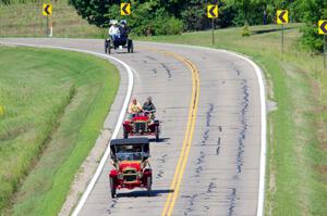 Jeff Schreiner's 1908 Maxwell, and John Dolan's 1903 Oldsmobile