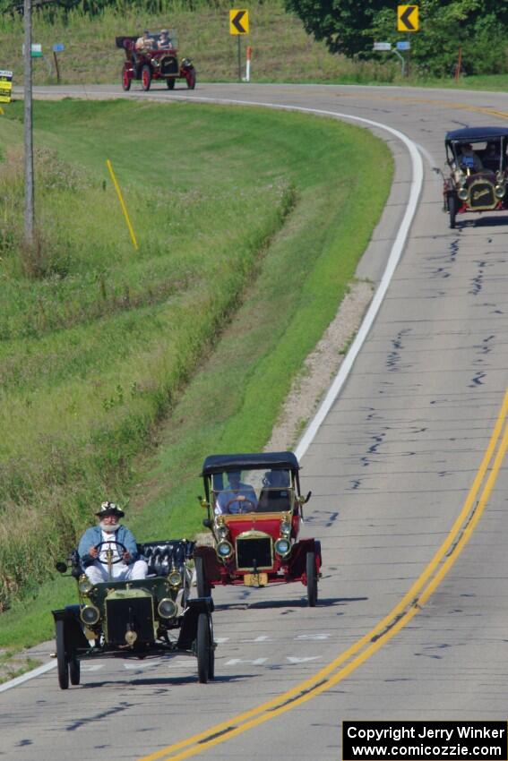 Gregg Lange's 1907 Ford, Todd Asche's 1910 Maxwell, Steven Williams' 1908 Buick and David Magy's 1909 Buick