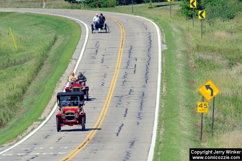 Jeff Schreiner's 1908 Maxwell, and John Dolan's 1903 Oldsmobile