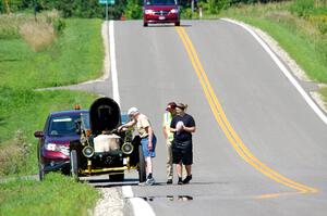 Gil Fitzhugh's 1907 Stanley Steamer stops for a brief fix.